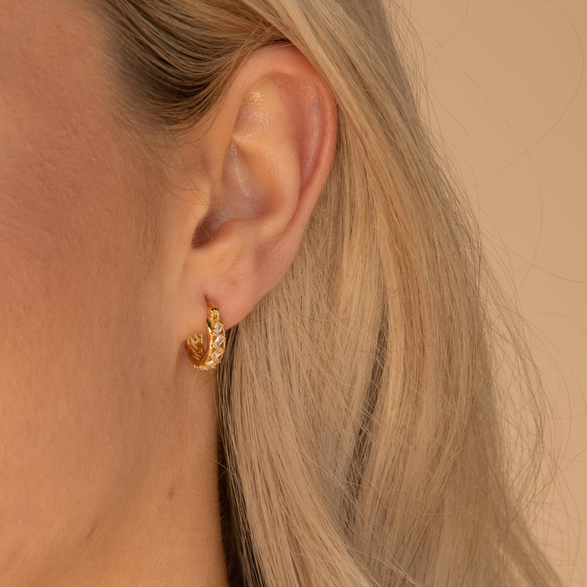 Floating Baguette Huggie Earrings Gold